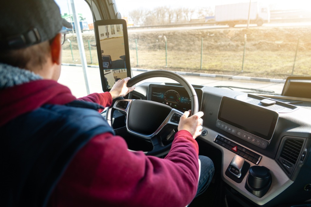 Driver taking a turn while driveing the truck